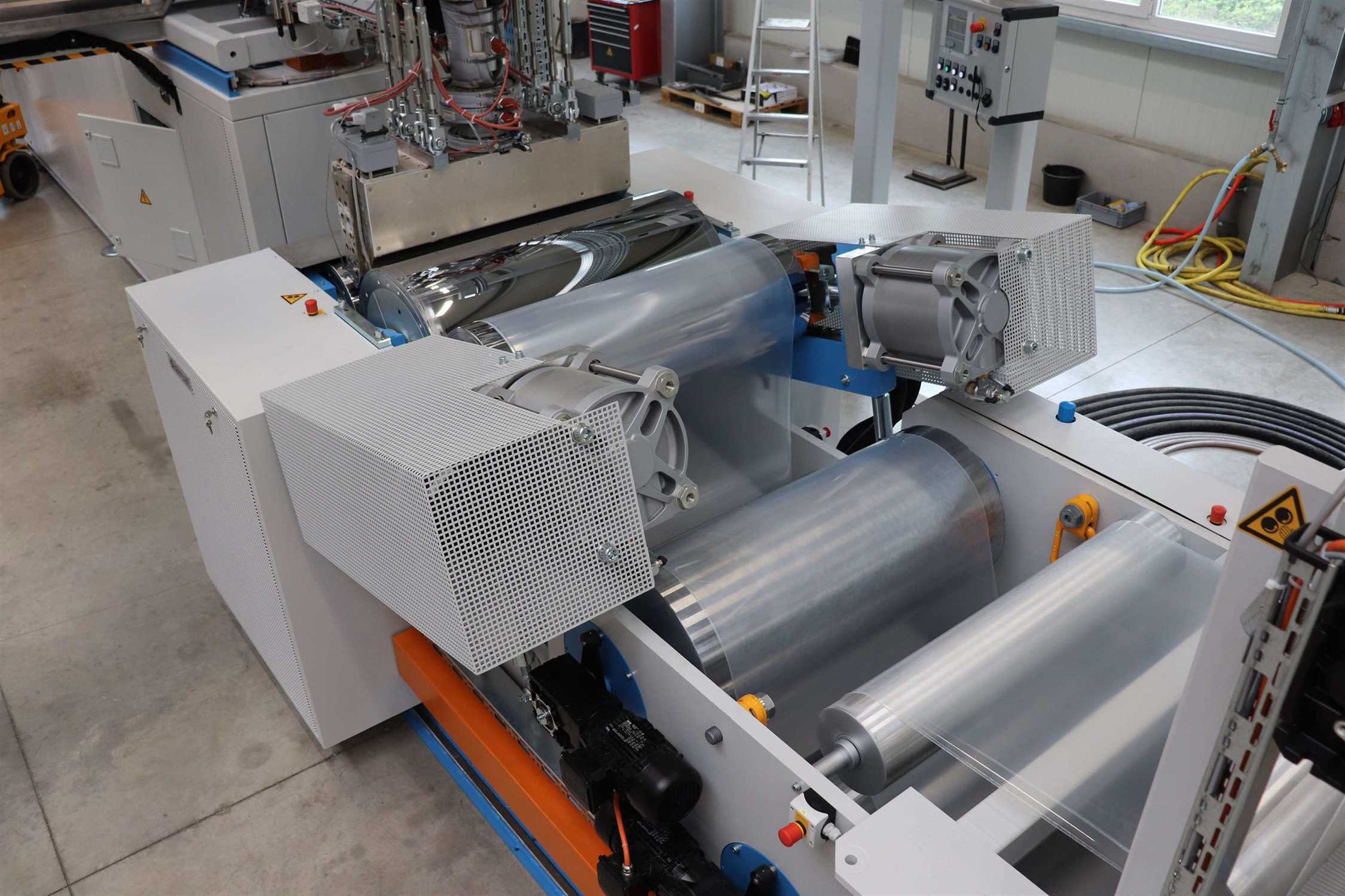 Calendering of plastic plate with rollers in a pet sheet extrusion line by diamat.